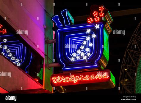 Las Vegas - Circa July 2017: Neon Walgreens Logo and Signage Night Location. Walgreens is an ...