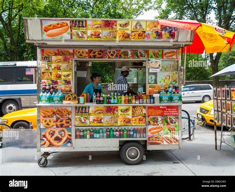 Traditional New York street food van truck stand, New York City, selling hot dogs, burgers ...