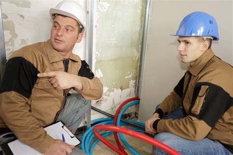 Electric Floor Heating System Installation in New House Stock Photo - Image of electric, builder ...