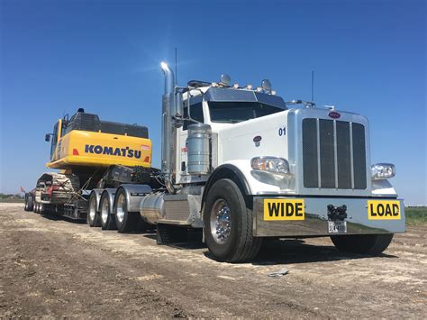 389 PETERBILT heavy hauling 490 KOMATSU