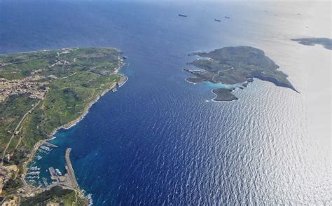 Malta-Blue-Lagoon-aerial-view - Packing Light Travel