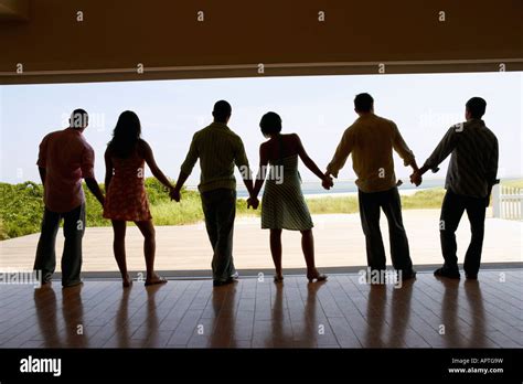 Friends Holding Hands Silhouette High Resolution Stock Photography and ...