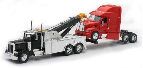 Buy New Ray SS-12053 Toys 1: 32 Scale Peterbilt Tow Truck with Red Peterbilt Cab Semi Truck ...