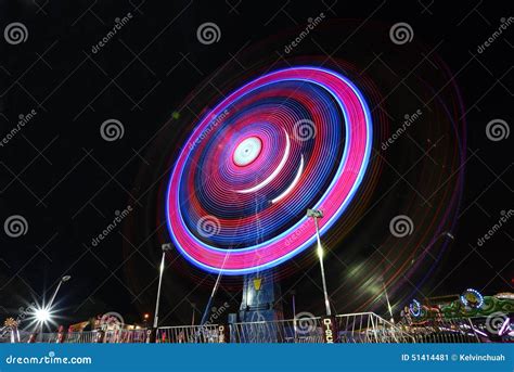 Fair rides at night stock image. Image of friends, carnival - 51414481