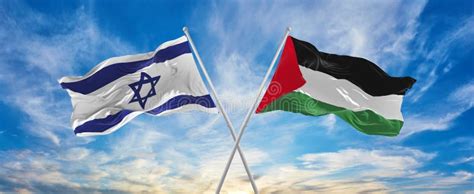 Crossed National Flags of Israel and Palestine Flag Waving in the Wind at Cloudy Sky ...