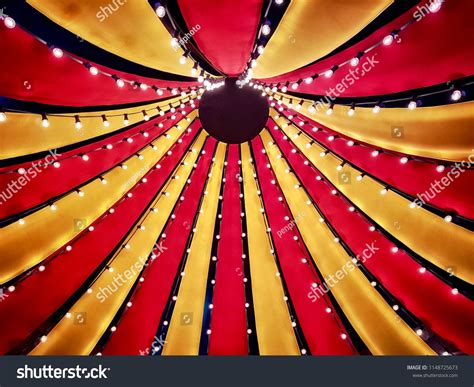 Circus tent top seen from inside | Circus tent, Circus decorations ...