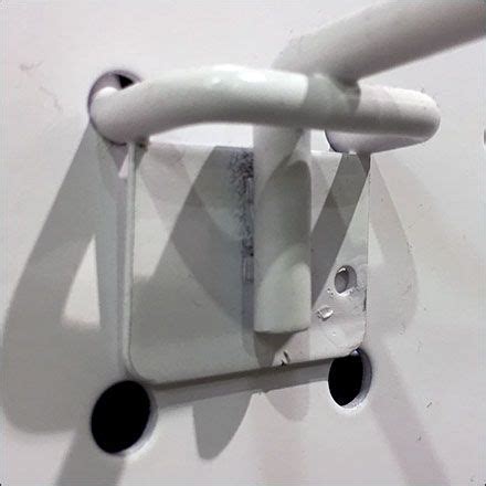 Perforated-Metal Pegboard Hook Retrofit | Perforated metal, Metal pegboard, Metal store