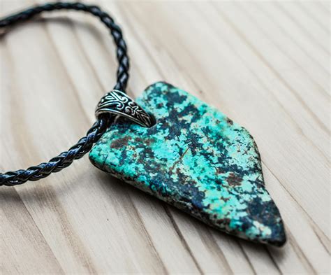 Grey and Black Stone Pendant on Black Necklace · Free Stock Photo