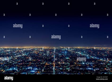 Aerial view of city at night Stock Photo - Alamy