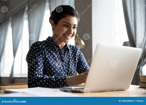 Smiling Indian Girl Student Professional Typing on Laptop at Table Stock Image - Image of online ...