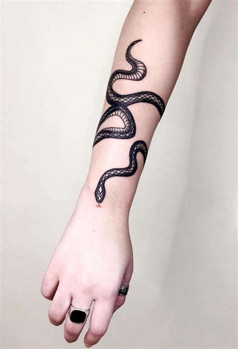 Discover 61+ snake and dagger forearm tattoo best - in.coedo.com.vn