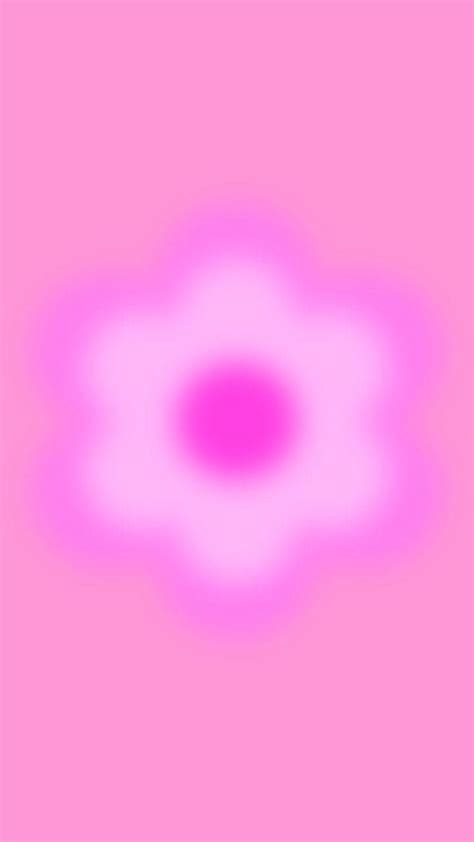 an abstract pink and white flower on a pink background