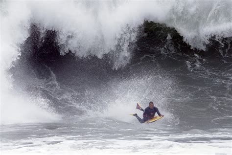 Photos: South swell churns up big waves at the Wedge in Newport Beach ...