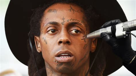 Lil Wayne Tattoos - What Is The Meaning Behind Lil Wayne S Biggest ...