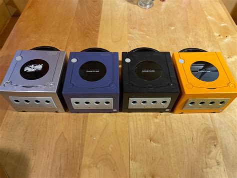 All 4 colors baby! Now i just gotta get the sticker off the gray one lol! : Gamecube