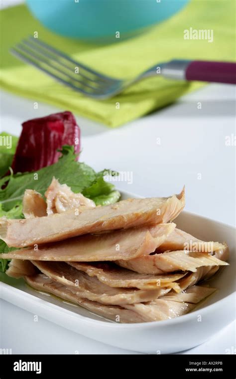 Tuna belly with salad Stock Photo - Alamy