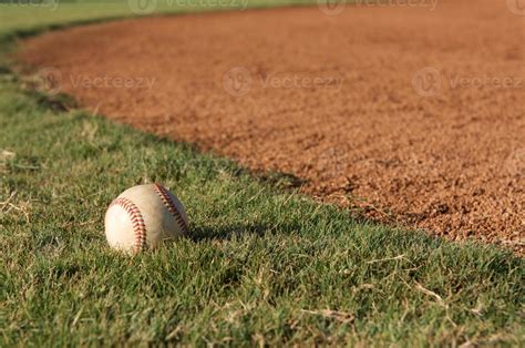 Baseball in the grass 943682 Stock Photo at Vecteezy