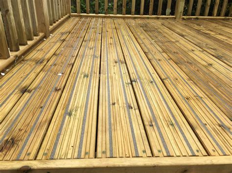 Softwood decking with anti slip boards | Deck installation, Wooden decks, Softwood