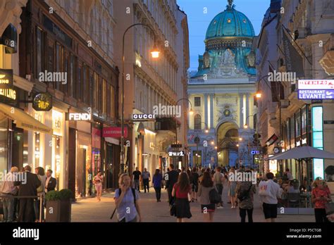 Austria, Vienna, Kohlmarkt, Michaelerplatz, shops, people, nightlife Stock Photo - Alamy