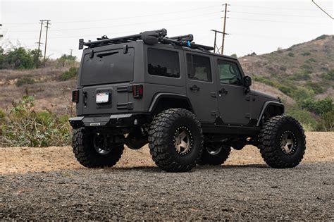 Completely Blacked Out Jeep Wrangler Shod in Off-Road Yokohama Tires and Black Rhino Wheels ...