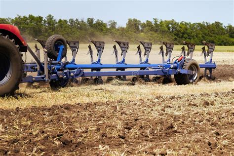 Large Modern Plow for Cultivating the Land Stock Photo - Image of field, large: 255555320