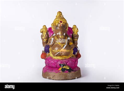 Ganesh chaturthi - Ganesh idol made of clay on white background Stock ...