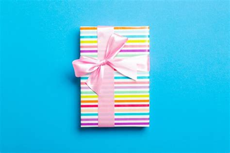 Premium Photo | Wrapped gift box with ribbon