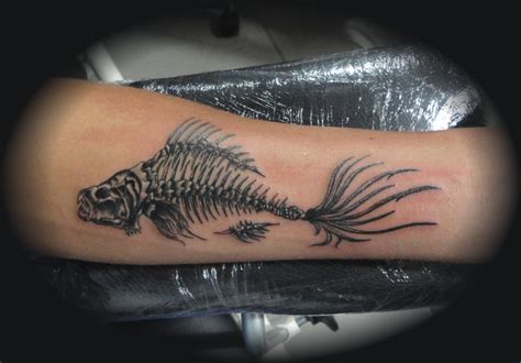 fishbone tattoo by TattnRoll on DeviantArt