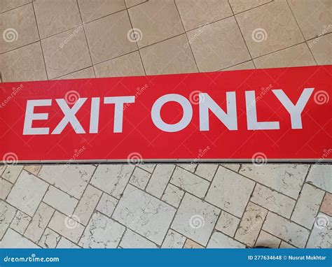 Red and White Exit Sign,exit only Sign on Floor Stock Photo - Image of ...