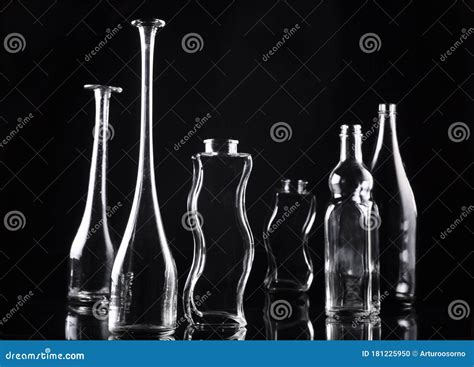 Glass Bottles on Black Background Stock Photo - Image of backgrounds ...