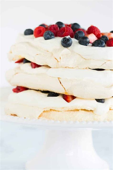 Pavlova Layer Cake with Whipped Cream & Berries - Brown Eyed Baker