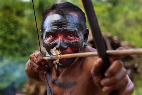 Beautiful photos of isolated tribe in remote Amazon rainforest, with mining companies edging closer