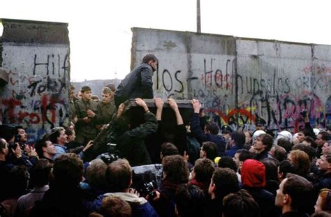 November 9, 1989 - The Berlin Wall collapsed, Germany united