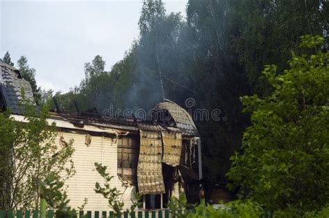 Damaged house after fire stock photo. Image of burnt - 186673502