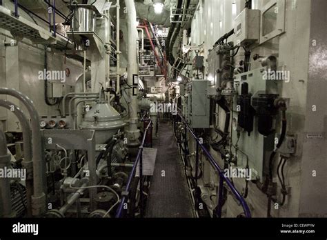 Engine room on naval aircraft carrier HMS Illustrius Stock Photo - Alamy