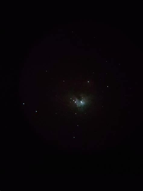 Orion Nebula. First time using a telescope, I captured this with my phone camera. : r/telescopes