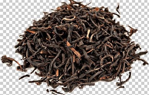 a pile of black tea on a white background with clippings to the side