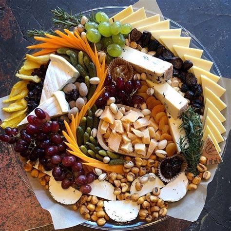 Beautiful presentation and selection of cheeses, fruits and nuts | Food platters, Cheese ...