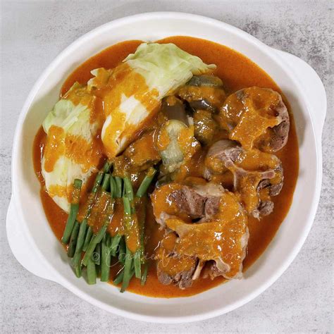 Kare-kare (oxtail and vegetables in peanut sauce)