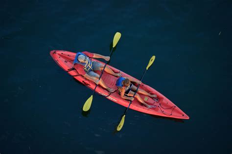 Photos by Michael Angelo — Kayaks floating on the Colorado River