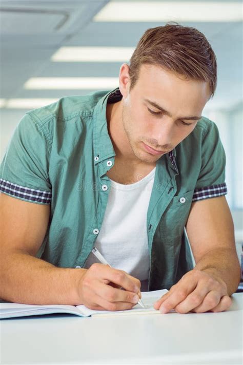 Student Taking Notes in Class Stock Photo - Image of assignment ...