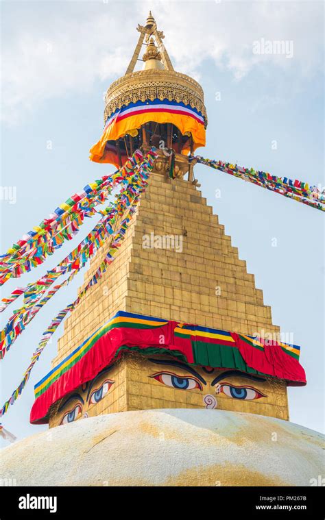 Boudhanath Stupa and prayer flags in Kathmandu, Nepal. Buddhist stupa of Boudha Stupa is one of ...