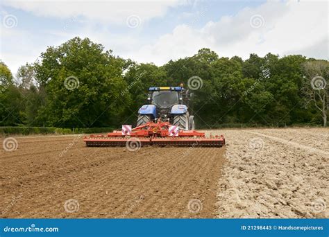 Tractor with Power Harrow stock image. Image of farmer - 21298443