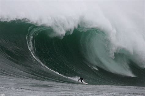 Surfing on the crest of a 70ft tall monster wave