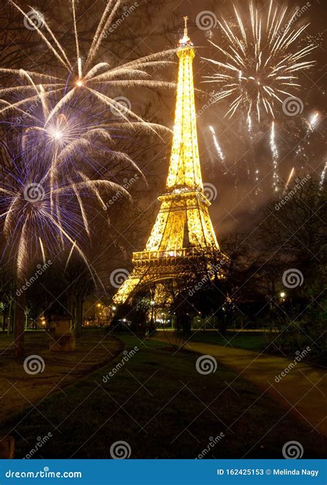 Celebrating New Year in the City - Eiffel Tower & X28;Paris, France ...