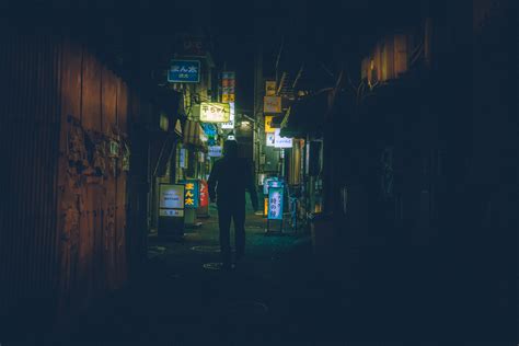 Capturing moody night street photography in Tokyo