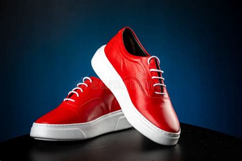 Mens Red Leather Shoes with White Soles on Blue Background Stock Image - Image of colour ...