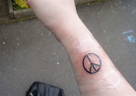 Peace Sign Tattoos Designs, Ideas and Meaning | Tattoos For You