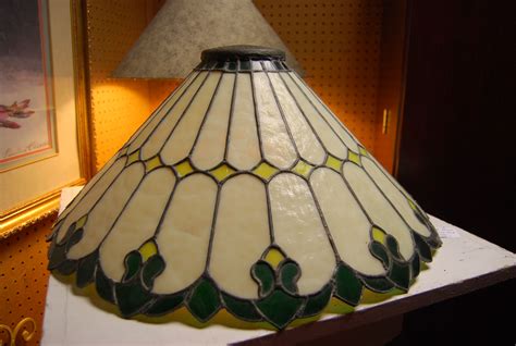 Antique stained glass lamp shade, very heavy. Can be seen at Gillespie Gardens on Facebook Gold ...