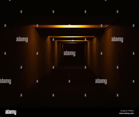 Dark empty tunnel Stock Photo - Alamy